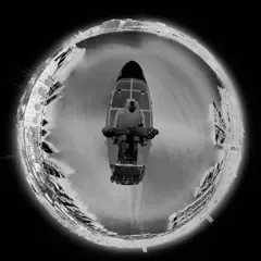 Little-planet thermal view of a vessel alongside at night, quay and mooring lines visible