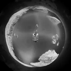 Little-planet thermal timelapse of a busy anchorage through the night