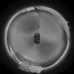 Little-planet daylight view of a sailing race finish off Malta