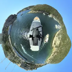 Little-planet 360 degree still of a transit through the Bonifacio strait, Corsica